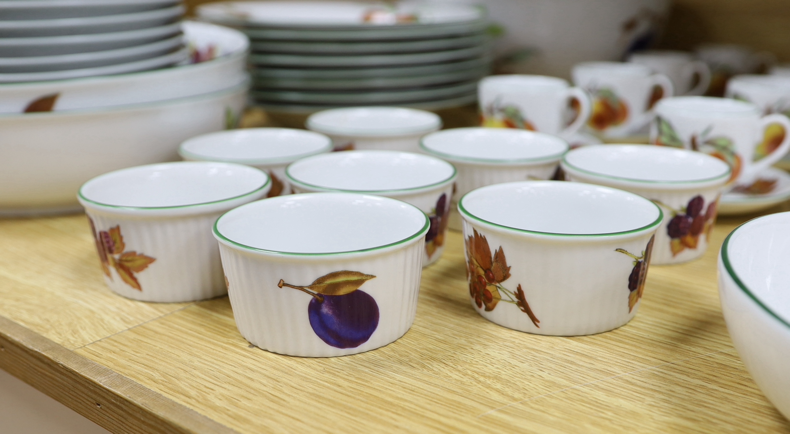 A large quantity of Royal Worcester Evesham Vale serving dishes and dinnerwares